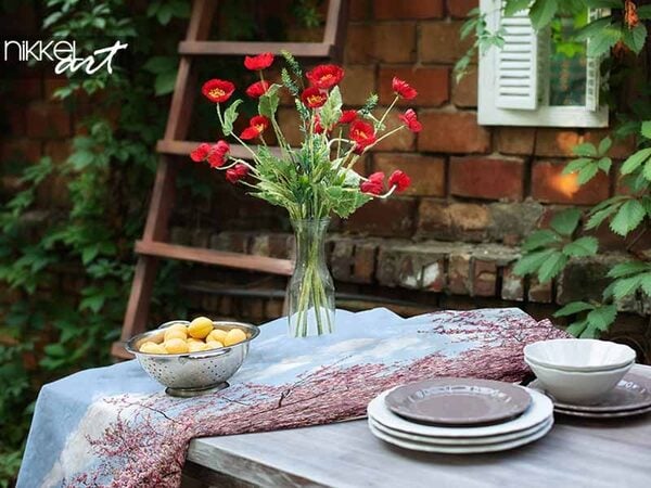 Manger dehors, encore plus convivial avec une nappe personnalisée